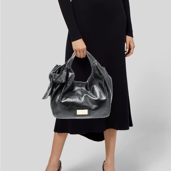 Valentino Handbags - Gorgeous Valentino, black leather bag with dust bag original price $1395